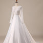 Ivory A Line Tulle Backless Wedding Dress with Long Sleeves V-neck