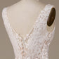 Ivory A Line Tulle Sweep Train Wedding Dress with Lace V-neck