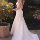 Stunning Wedding Gown with Deep Neckline and Floral Accents Off Shoulder