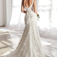 Stunning Wedding Gown with Deep Neckline and Floral Accents Off Shoulder