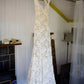 Lace Sheath/Column V-Neck Wedding Dresses With Bow(S) Sweep Train Sleeveless Elegant