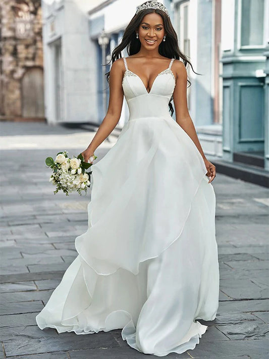 A-Line/Princess V-neck Organza Sleeveless Beading Sweep/Brush Train Wedding Dresses Sexy