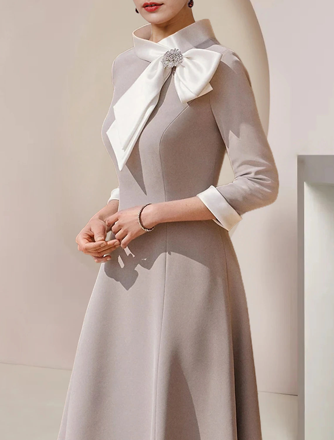 A-Line Mother of the Bride Dress Formal Wedding Guest Party Elegant High Neck Asymmetrical Tea Length Satin 3/4 Length Sleeve with Bow(s) Crystal